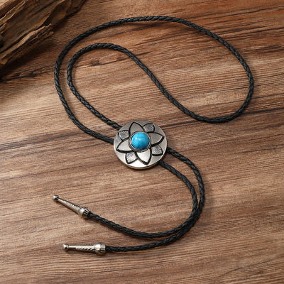 Oval Carved Petal Black Turquoise Stone Bolo Tie