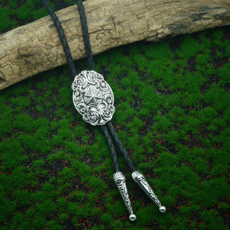 Western Texas Silver Star Carving Bolo Tie